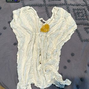 Silver and white bathing suit cover up. New with tags